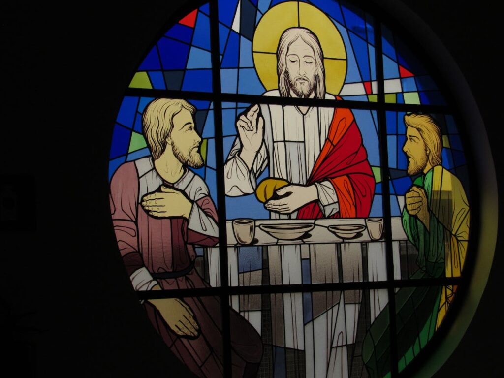 Vivid stained glass depicting a scene from the Last Supper in Cordeirópolis, Brazil.